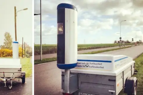 Mobil fartkamera på släp vid vägkanten. Enligt skylten arbetar Trafikverket för trafiksäkerhet.