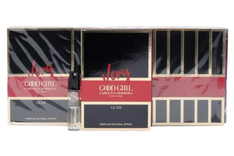 Zestaw próbek perfum Good Girl Carolina Herrera w wersji Glam. Eleganckie opakowania z czarnymi i czerwonymi akcentami.
