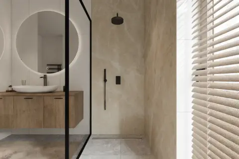 Modernes Bad mit Holzboden und Marmor-Dusche. Ein Waschbecken mit Spiegel und eine Dusche sind sichtbar. Ideal für ein **bad renovieren ohne fliesen abschlagen**.