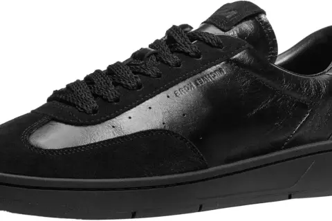 Sneakers uomo Michael Kors nere in pelle e camoscio, un look audace per ogni occasione.
