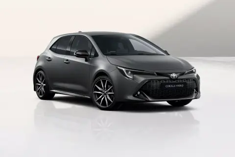 Nowoczesna, ciemnoszara Toyota Corolla Hybrid z felgami o sportowym wzorze, prezentowana na białym tle.