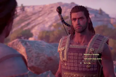 Alexios w zbroi, z łukiem na plecach, rozmawia z kimś w grze Assassin's Creed Odyssey - poradnik.