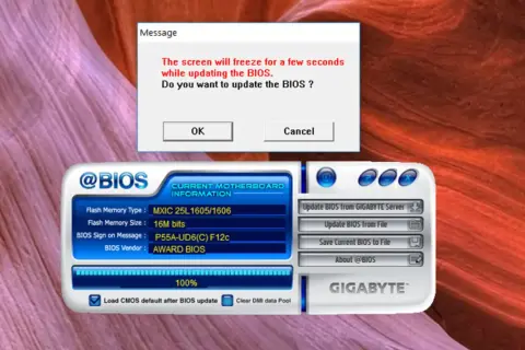 Ventana de mensaje advierte que la pantalla se congelará al actualizar BIOS. Se muestra la interfaz de @BIOS para actualizar BIOS de placa base Gigabyte.