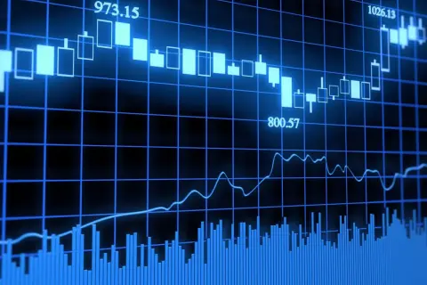 Wykresy finansowe pokazują zmienność rynkową, sugerując potencjalną fuzję banków i jej wpływ na kursy.