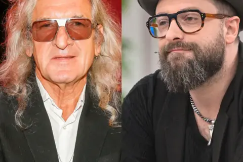 Dwaj artyści, jeden z długimi blond włosami i okularami przeciwsłonecznymi, drugi z brodą i okularami w stylu retro. Tworzą duet, który mógłby ułożyć perfect piosenki alfabetycznie.