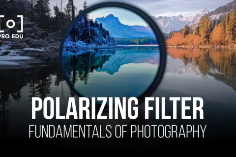 A polarizing filter enhances a landscape photo, reducing glare and deepening colors. The image shows a lake reflecting mountains and trees, with the filter in the foreground.