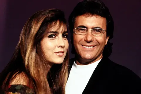Para Al Bano i Romina Power, uśmiechnięci, emanują szczęściem. Ich wspólna **felicita po polsku tekst** to historia miłości i muzyki.