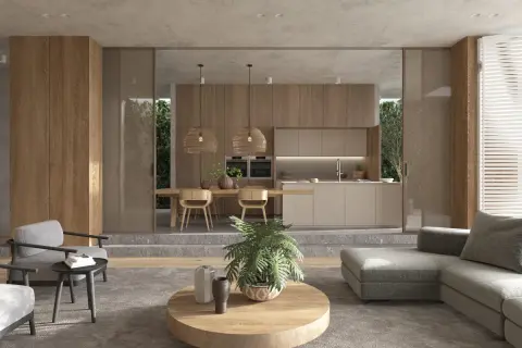 Ein Wohnzimmer mit Essbereich und Küche im Japandi Stil. Natürliche Materialien und dezente Farben schaffen eine ruhige Atmosphäre.