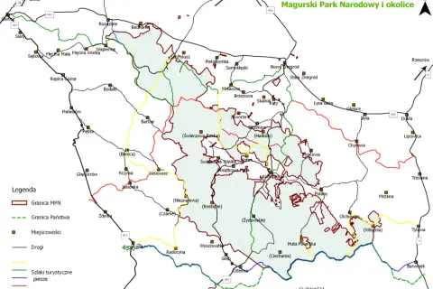 Mapa Magurskiego Parku Narodowego z zaznaczonymi szlakami turystycznymi, drogami i miejscowościami.
