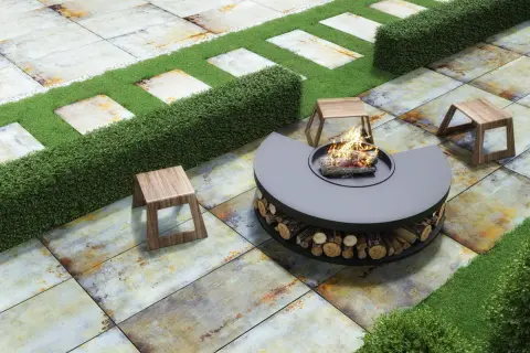 Modern patio with fire pit and stools on rustic tiles, perfect for **suelos para jardín sin obra**.