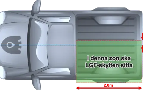 Översiktsbild av en traktor med en markerad zon där en LGF-skylt ska sitta.