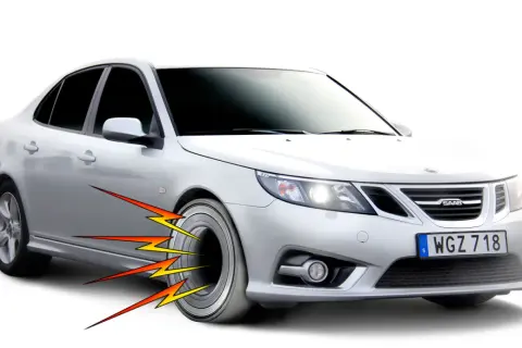 Silver Saab med blixtar som indikerar ett dåligt hjullager.