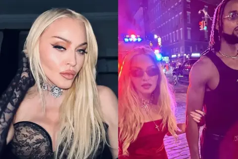 Madonna w czarnej koronkowej kreacji i w czerwonej sukience z partnerem na tle nocnego miasta.