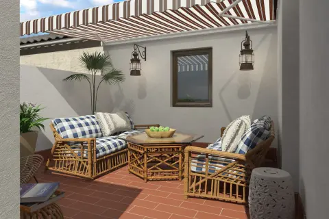 Ideas para decorar un patio sencillo: muebles de ratán, cojines a cuadros y plantas crean un espacio acogedor.