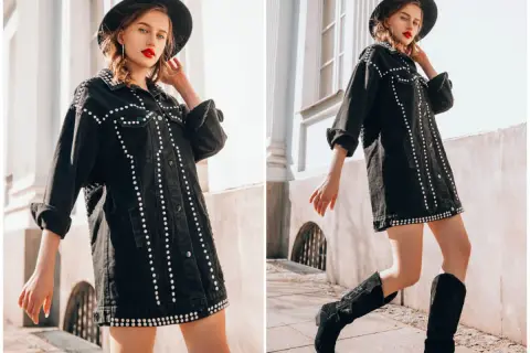 Modelka w czarnej kurtce z ćwiekami i kapeluszu, w stylu grunge, pozuje na tle architektury.