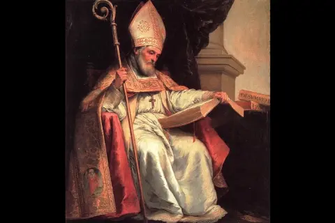 Isidoro de Sevilla, obispo con mitra y báculo, lee un libro.