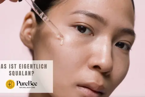 Ein Tropfen Squalane wird mit einer Pipette auf die Haut aufgetragen. Was ist Squalane? PureBee Natural Body Care.