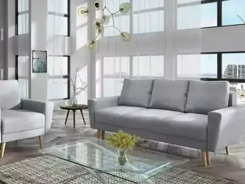 Jak zaaranżować salon z szarą kanapą? Inspiracje i porady