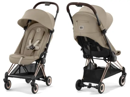 Elegancki wózek spacerowy Cybex w kolorze beżowym, z brązową rączką i złotymi elementami. Idealny na spacery.