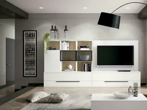 Estantería blanca moderna con TV, ideal como inspiración de colores para salones pequeños.