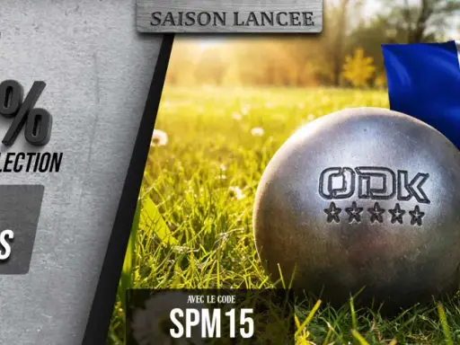 Deux boules de pétanque ODK, symbole de la fabrication française, sur un fond d'herbe et de drapeau tricolore. Promotion -15%.