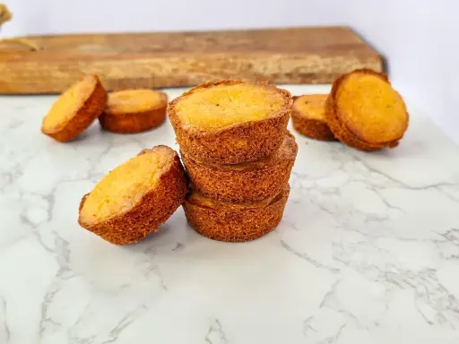 Pile de palets bretons dorés, parfaits pour une recette facile.