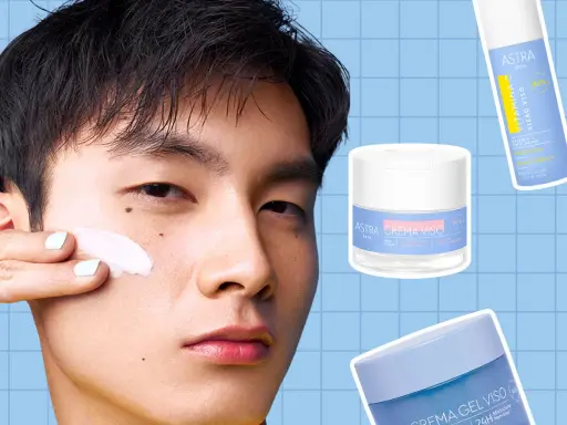 Uomo applica crema viso. Accanto, siero Vitamina C e creme Astra. Scegliere di usare siero senza crema per una routine leggera.