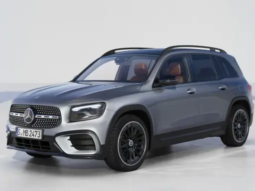 Szary Mercedes GLB 200 z brązowym wnętrzem, prezentujący nowoczesny design i komfort.