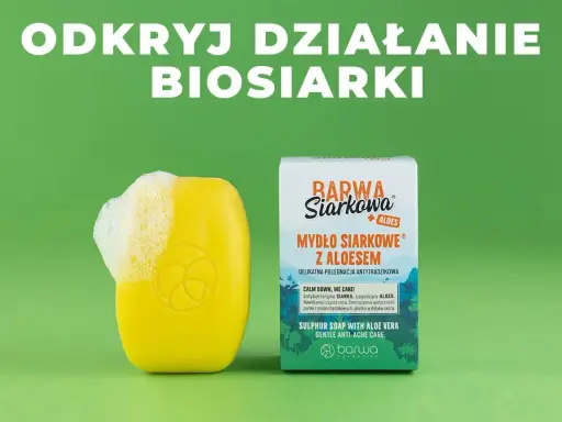 Żółte mydło z pianą i opakowanie "Mydło Siarkowe z Aloesem". Odkryj działanie siarki w pielęgnacji.