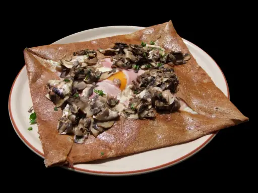 Galette complète garnie de jambon, œuf, champignons et persil. Une recette savoureuse pour un repas rapide.
