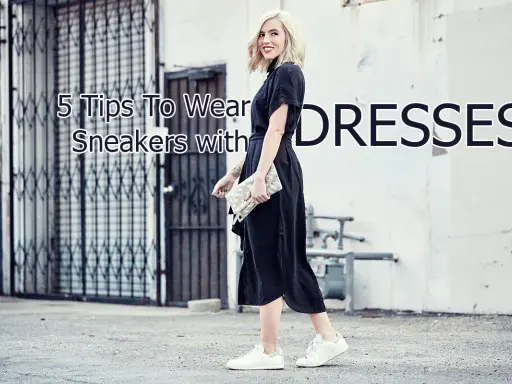 A woman shows how to wear sneakers with a dress, pairing white sneakers with a black midi dress and a clutch.
