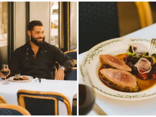 Un chef souriant savoure un plat de nourriture parisienne, un délice de viande et de légumes sur une assiette ornée.