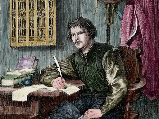 Martin Luther schreibt mit einer Feder. Wann wurde Martin Luther geboren? Die Frage beschäftigt Historiker seit Jahrhunderten.