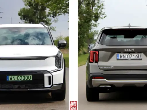 Biała Kia EV9 z przodu i szara Kia Sorento z tyłu, obie na drodze.