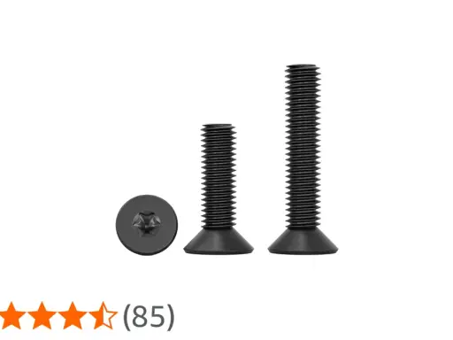 Tres tornillos estrella negros, uno de frente y dos de perfil, uno más corto que el otro.