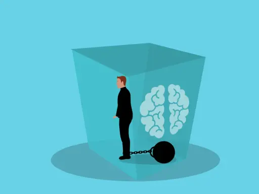 Mann in schwarzem Anzug mit Fußfessel, gefangen in einer Box mit Gehirn. Depression macht soziale Kontakte anstrengend.