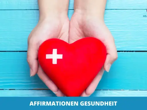 Hände halten ein rotes Herz mit einem weißen Kreuz. Es symbolisiert positive Affirmationen für Gesundheit und Wohlbefinden.