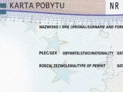 Fragment karty pobytu czasowego z danymi osobowymi i numerem dokumentu.