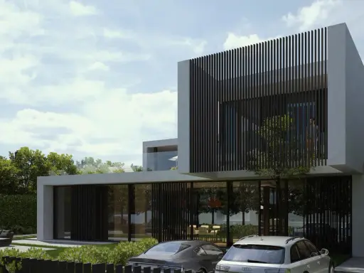 Moderne Villa in Karaj, Iran, mit zwei Autos davor und üppiger grüner Umgebung.