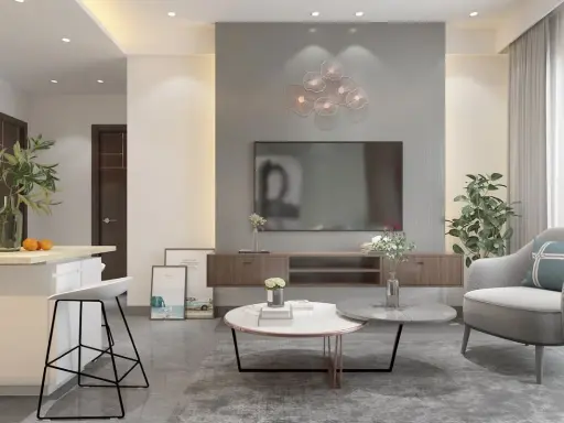 Soggiorno moderno con divano grigio, tavolini rotondi e decorazioni floreali. I colori da abbinare al grigio perla includono tocchi di verde e arancio.