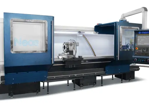 Tornio CNC MCM Neos, con mandrino e pannello di controllo digitale.