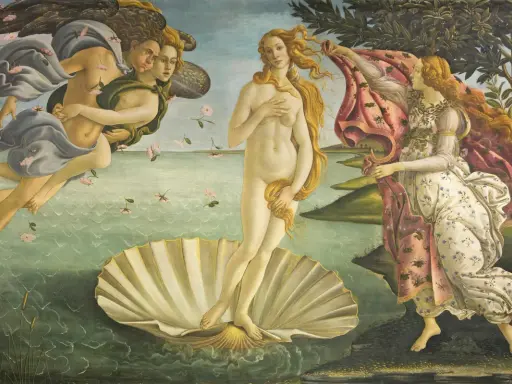 La Nascita di Venere agli Uffizi: Venere su una conchiglia, spinta da Zefiro e Aura, accolta da una ninfa.