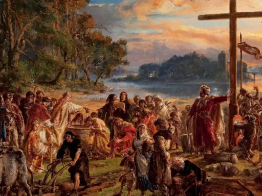 Chrzest Polski. Ludzie przy krzyżu, symbolizującym przyjęcie chrześcijaństwa, przypominają o misji, jaką mieli Cyryl i Metody, kim byli i co zrobili dla Słowian.