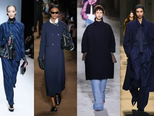 Modelli in passerella mostrano come abbinare il blu scuro: con stampe floreali, jeans, perle e tessuti sartoriali.