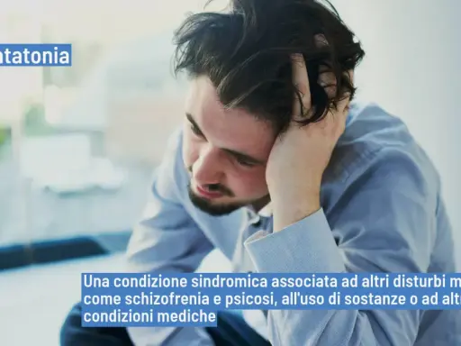 Uomo con mano tra i capelli, con testo "Catatonia" e la sua definizione. Il catatonia significato è una condizione sindromica.