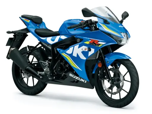 Niebieski motocykl sportowy Suzuki GSX-R 125 z białymi i żółtymi akcentami, gotowy na podbój dróg.