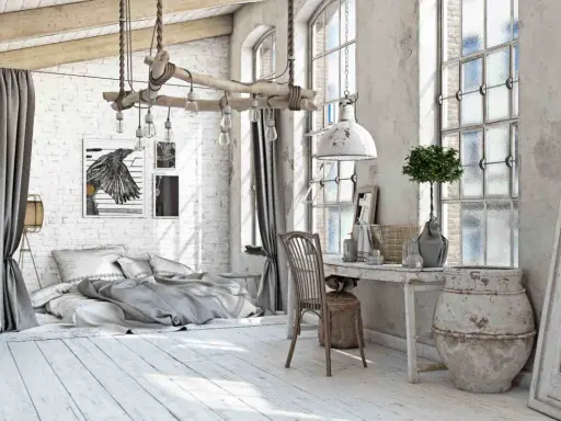 Camera da letto con pareti in mattoni bianchi, letto king-size, lampadario rustico e un grande vaso. Perfette idee arredamento vintage.