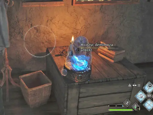 Na stole w Hogwarcie lśni magiczny Księżyc demimoza, otoczony blaskiem.
