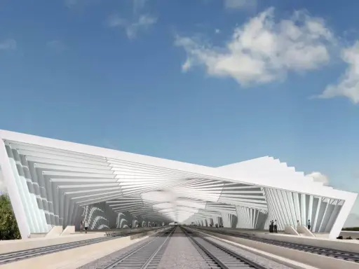Stazione Reggio Emilia, un capolavoro dell'architetto con un tetto bianco a spirale che copre i binari.