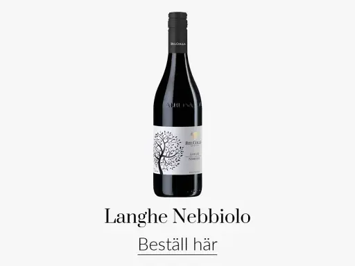 En flaska Bel Colle Langhe Nebbiolo, ett utsökt italienskt vin med en vacker etikett som föreställer ett träd.
